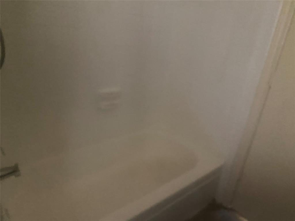 2809 Wimbledon Court, Unit C Garland, TX 75041 - Photo 18 of 23 a close up of a white marble wall