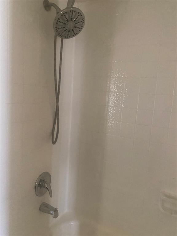 2809 Wimbledon Court, Unit C Garland, TX 75041 - Photo 19 of 23 a bathroom with a shower