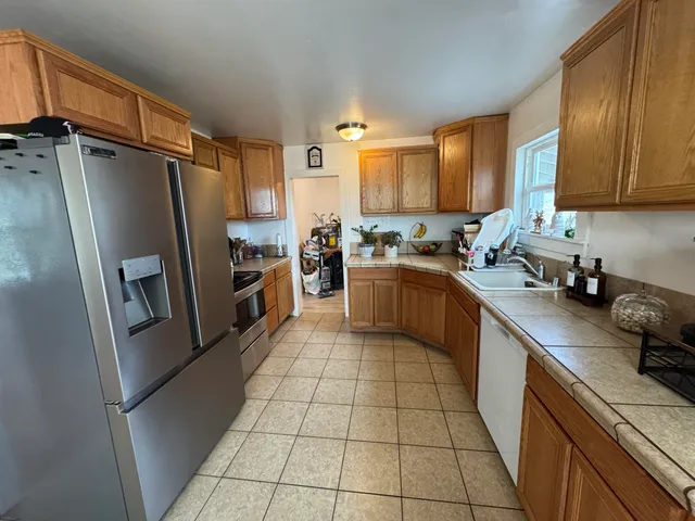 a bedroom with a bed and a chair