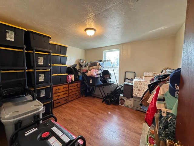 a white toilet sitting next to a shower curtain