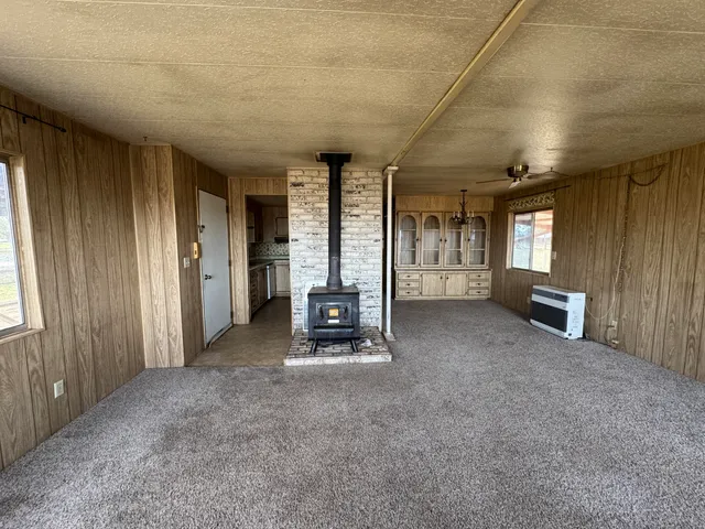 a bathroom with a granite countertop sink mirror and double