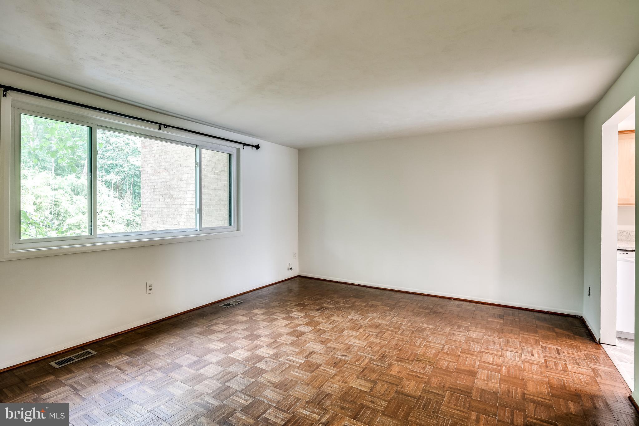 8966 Footed Ridge Columbia, MD 21045 - Photo 13 of 30 BRIGHT LIVING ROOM AND DINING ROOM