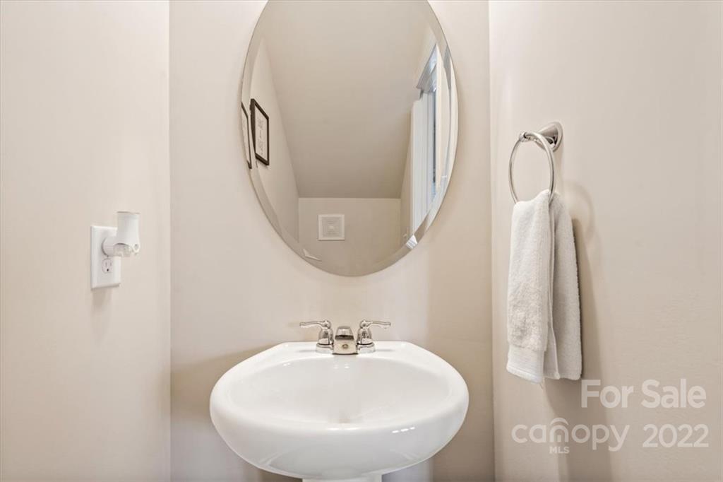 530 Hunters Dance Road Fort Mill, SC 29708 - Photo 17 of 35 a bathroom with a sink and mirror