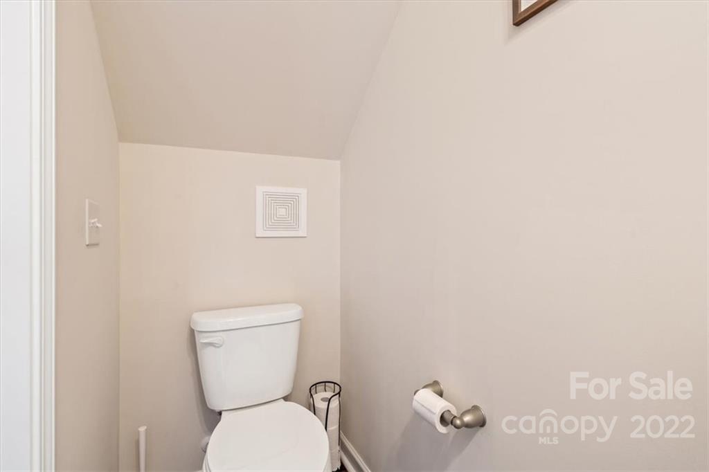 530 Hunters Dance Road Fort Mill, SC 29708 - Photo 18 of 35 a white toilet sitting next to a white wall