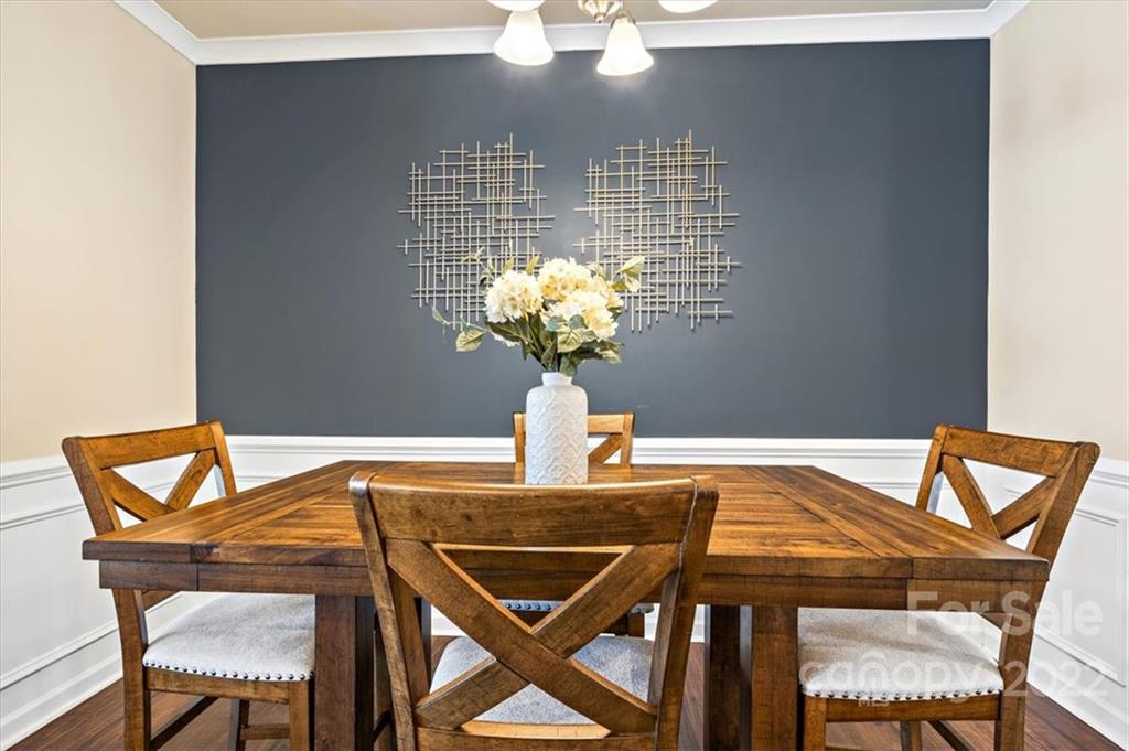 530 Hunters Dance Road Fort Mill, SC 29708 - Photo 5 of 35 a view of a dining room with furniture and wooden floor