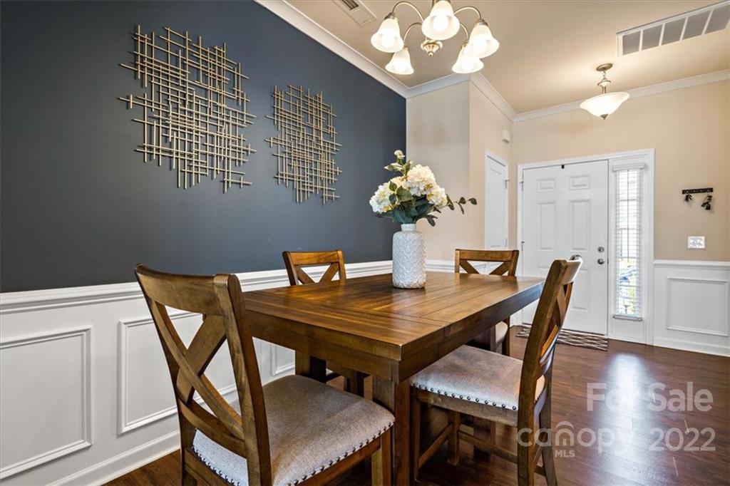 530 Hunters Dance Road Fort Mill, SC 29708 - Photo 6 of 35 a view of a dining room with furniture and wooden floor