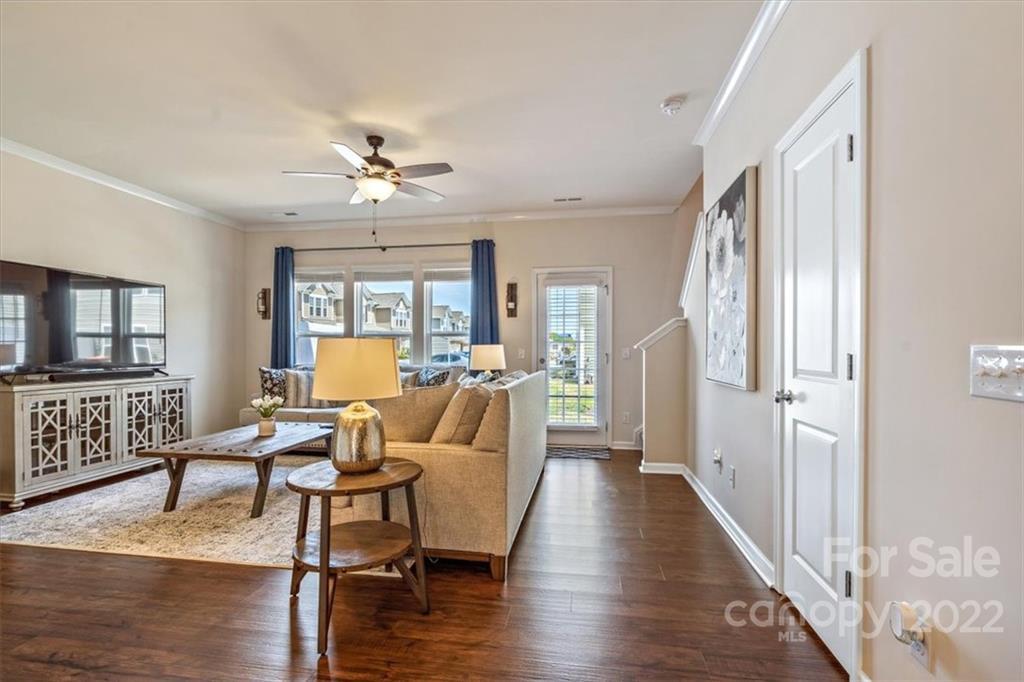 530 Hunters Dance Road Fort Mill, SC 29708 - Photo 8 of 35 a living room with fireplace furniture and a wooden floor