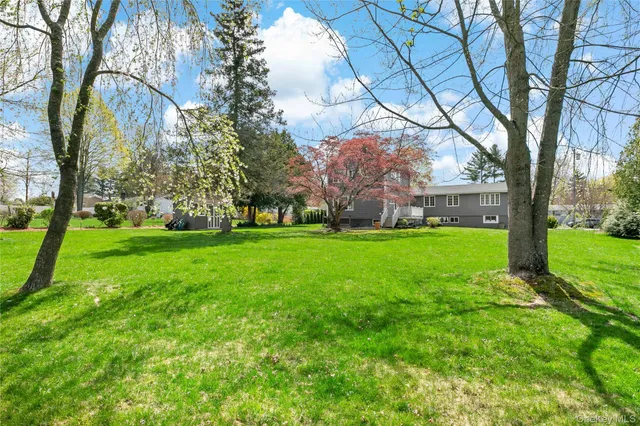 a view of building with green space