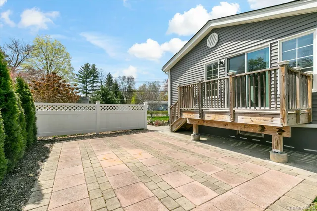 a house with a bench in front of it