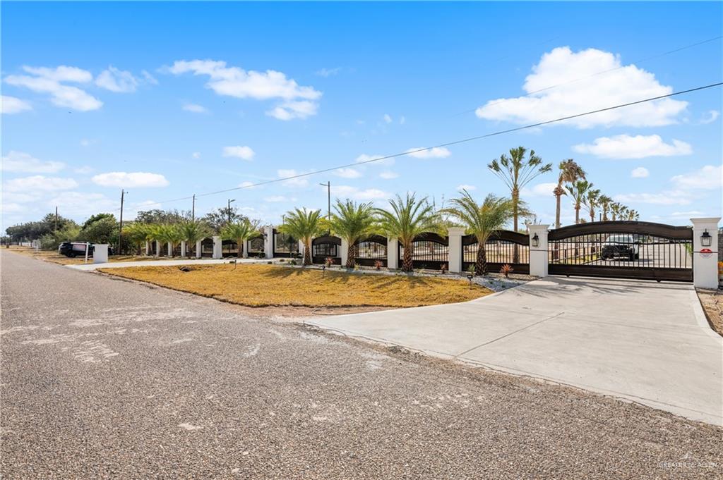 5501 Mile 8 1/2 Road Edinburg, TX 78541 - Photo 18 of 36 View of front of property with a gate