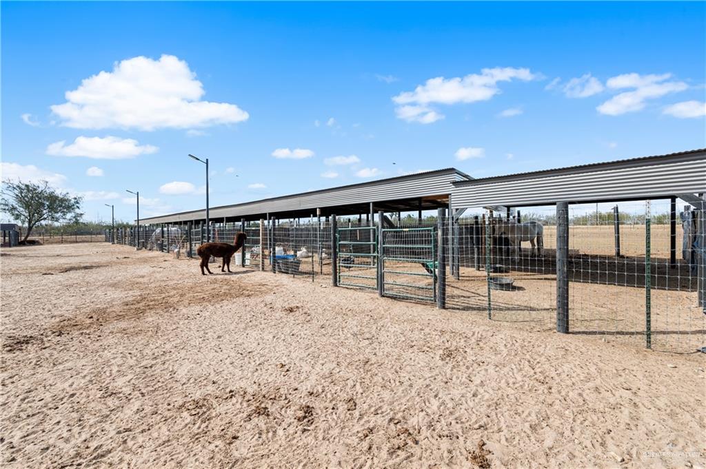 5501 Mile 8 1/2 Road Edinburg, TX 78541 - Photo 29 of 36 Horse barn with a view of countryside