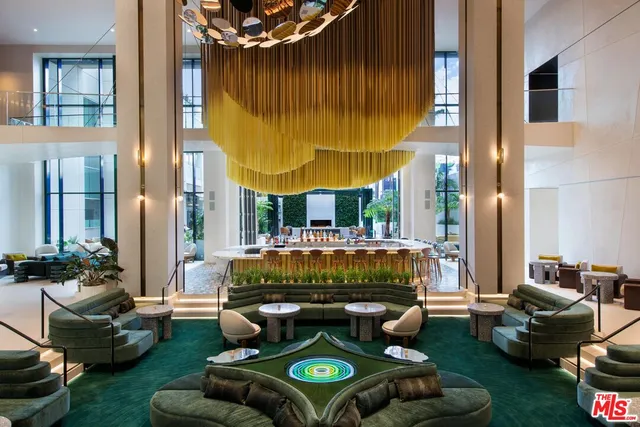 a table tennis table and chairs in front of a building