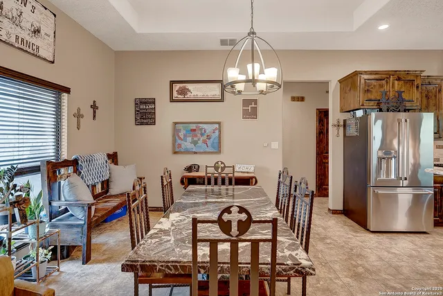 a kitchen with sink stove and cabinets
