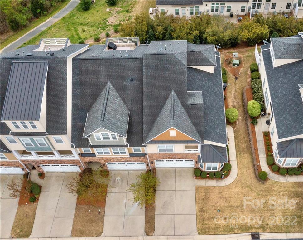 320 Wave Crest Drive Tega Cay, SC 29708 - Photo 4 of 46 an aerial view of residential house with outdoor space and swimming pool