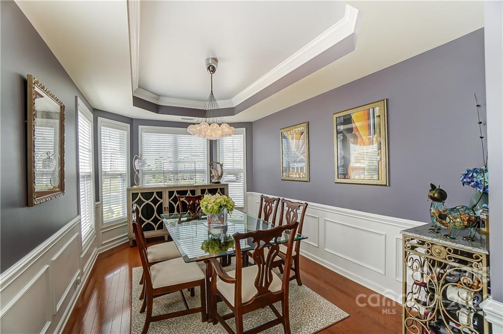 320 Wave Crest Drive Tega Cay, SC 29708 - Photo 7 of 46 a view of a dining room with furniture window and outside view