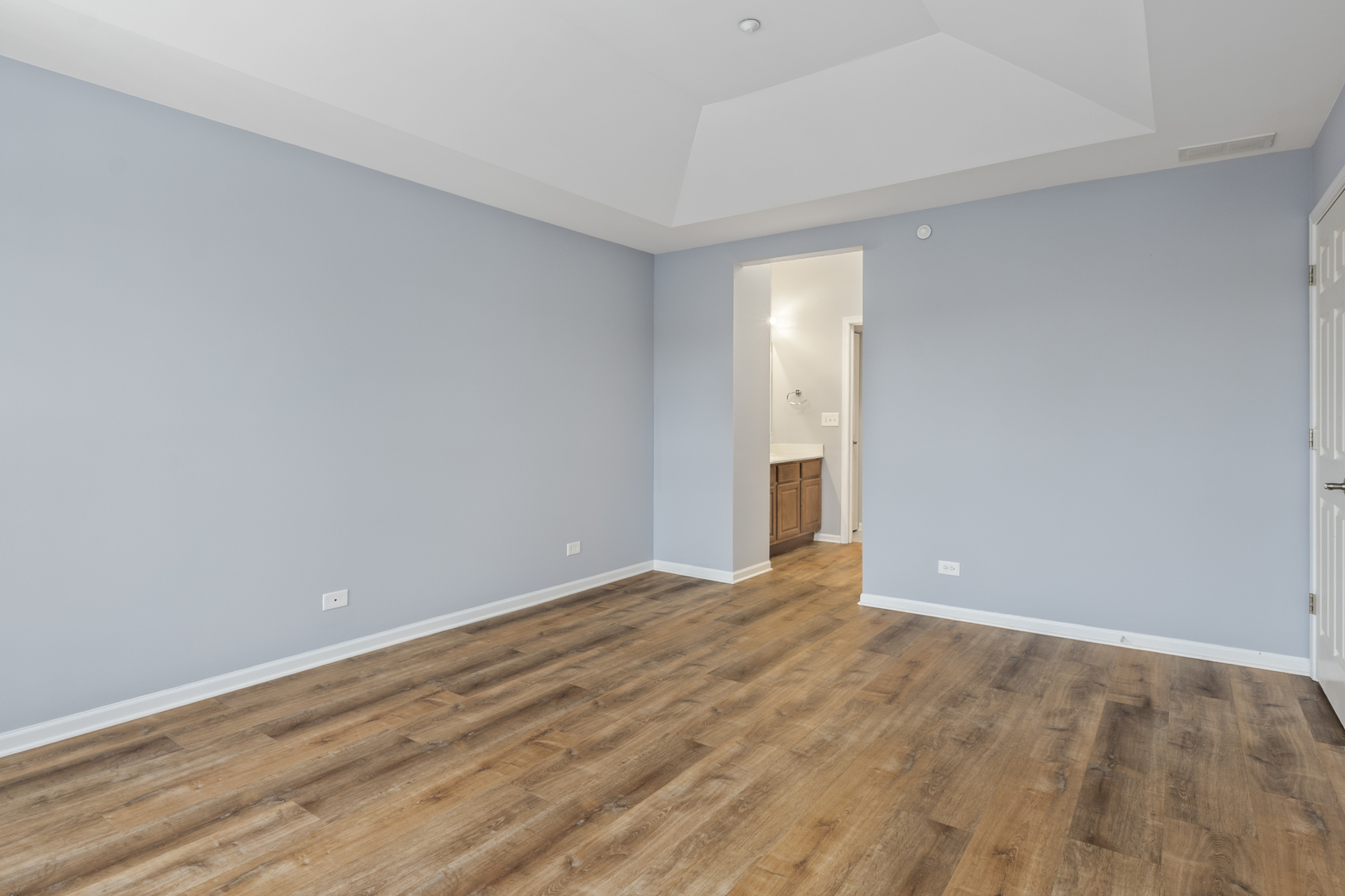 484 Prestwick Lane Wheeling, IL 60090 - Photo 15 of 36 a view of an empty room with wooden floor