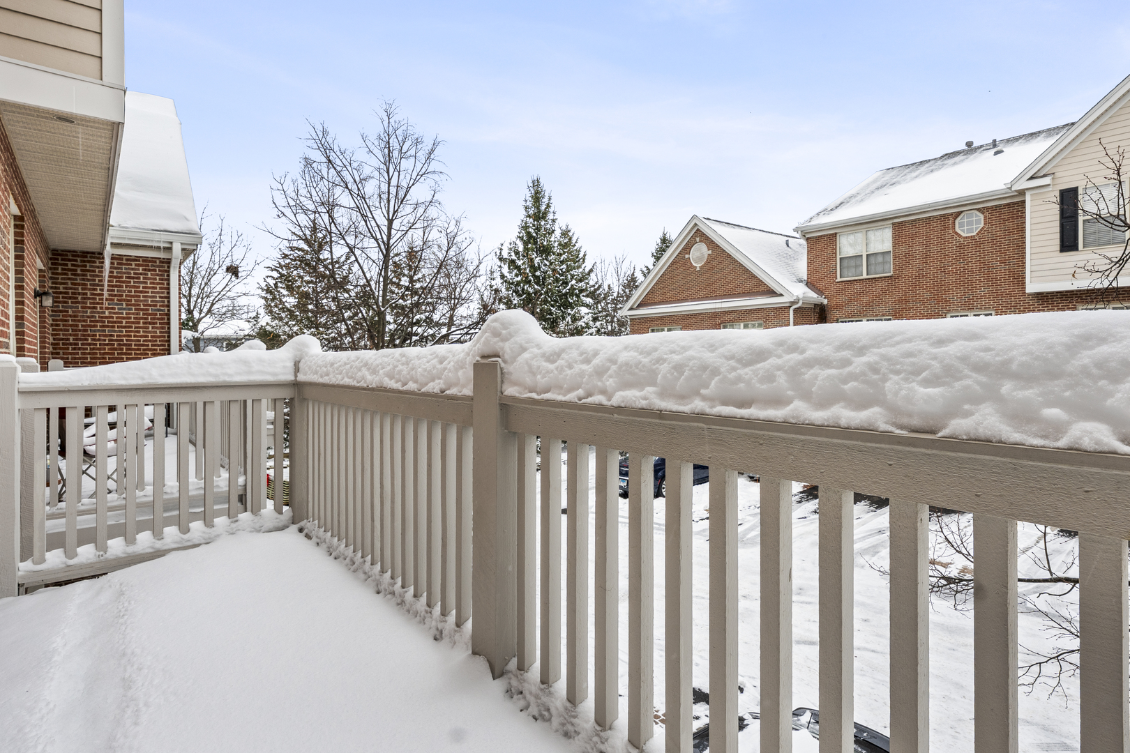 484 Prestwick Lane Wheeling, IL 60090 - Photo 30 of 36 a view of a wooden fence and a yard