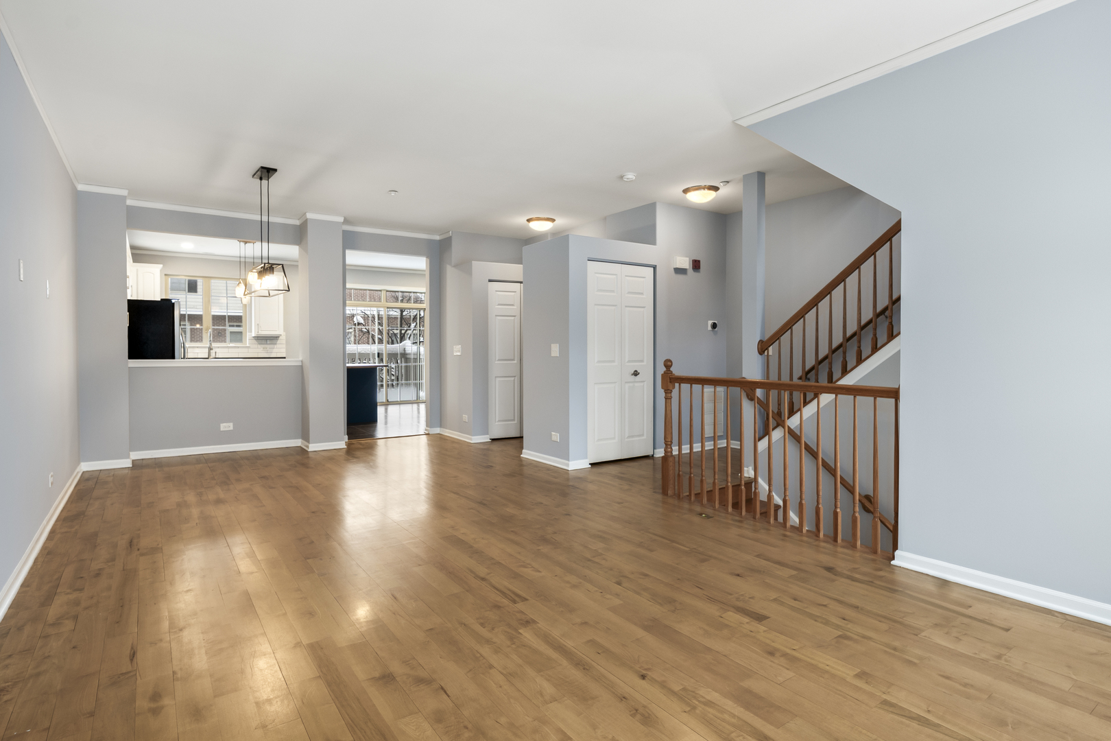 484 Prestwick Lane Wheeling, IL 60090 - Photo 5 of 36 a view of empty room with wooden floor and fan