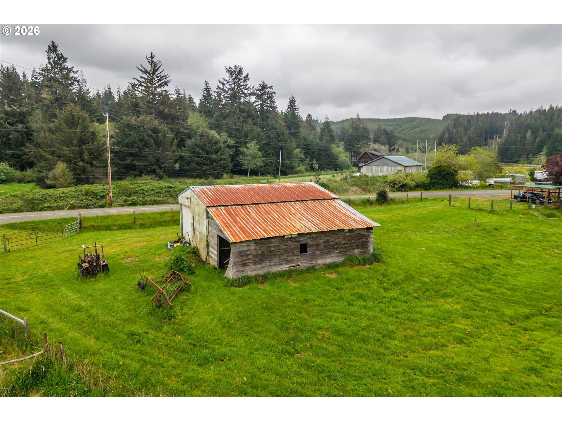 63008 Red Dyke Road Coos Bay, OR 97420 - Photo 16 of 18 a view of a golf course with a garden