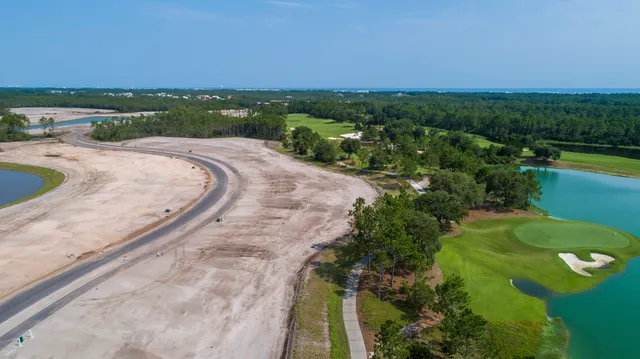 a view of a lake with a building in the background