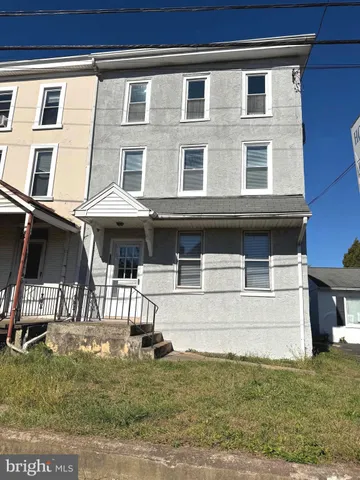 a house view with a outdoor space