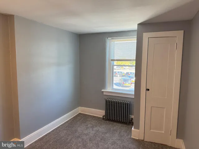 a bathroom with a toilet and a sink