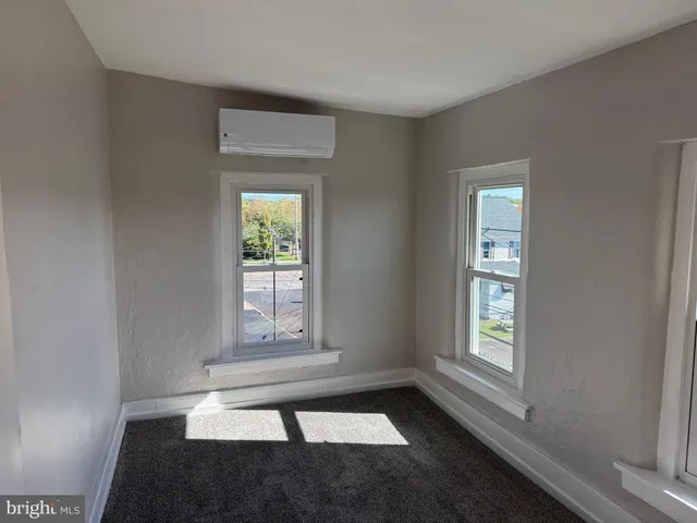 an empty room with windows