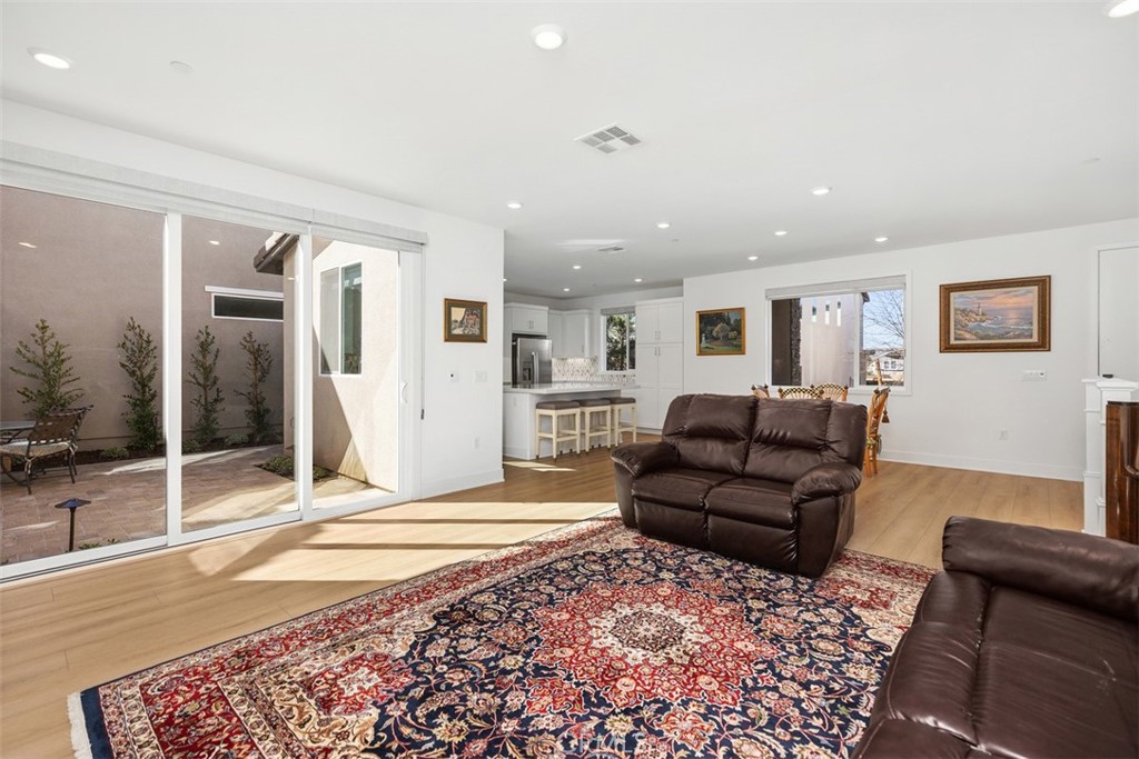 218 Sora Irvine, CA 92618 - Photo 17 of 65 a living room with furniture and a rug