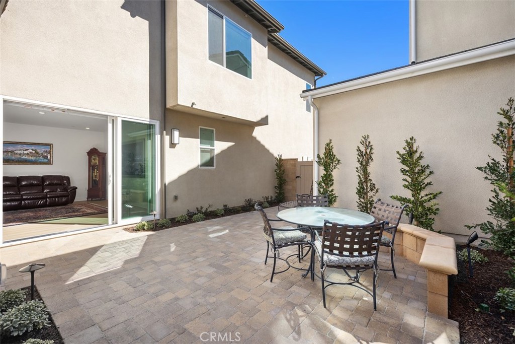 218 Sora Irvine, CA 92618 - Photo 20 of 65 a backyard of a house with table and chairs