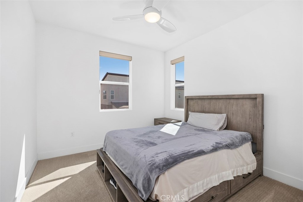 218 Sora Irvine, CA 92618 - Photo 30 of 65 a bedroom with a bed and a window