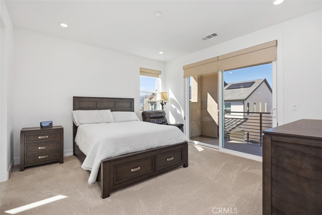 218 Sora Irvine, CA 92618 - Photo 38 of 65 a spacious bedroom with a bed and a dresser