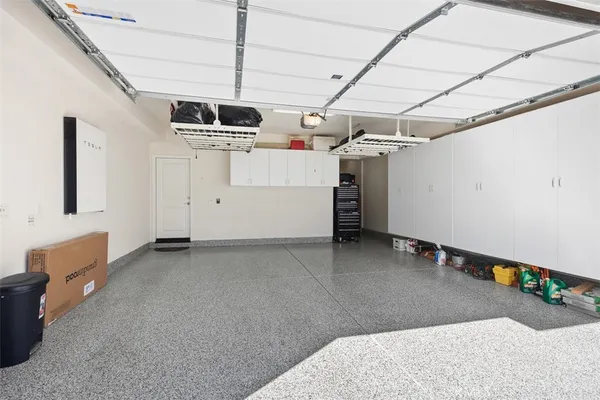 a view of a balcony with chairs