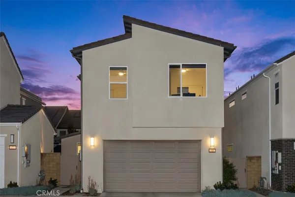 a living room with furniture wooden floor and a flat screen tv