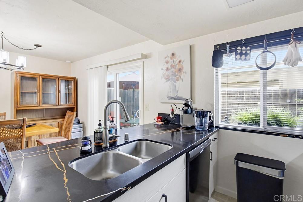 7861 Rancho Fanita Drive, Unit B Santee, CA 92071 - Photo 13 of 47 a kitchen with a sink and a large window