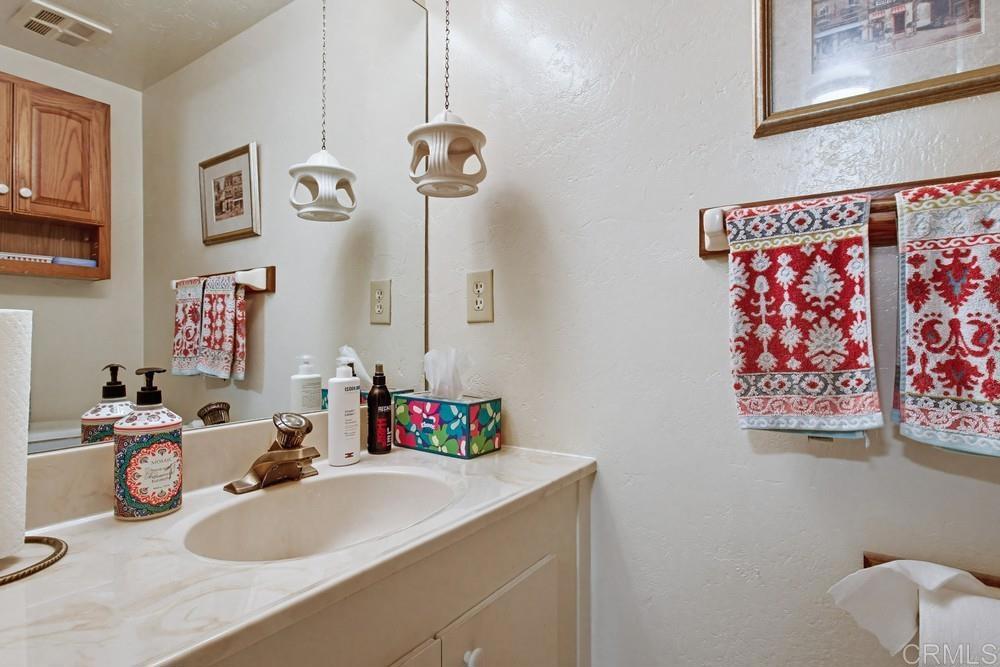 7861 Rancho Fanita Drive, Unit B Santee, CA 92071 - Photo 18 of 47 a bathroom with a sink and a mirror
