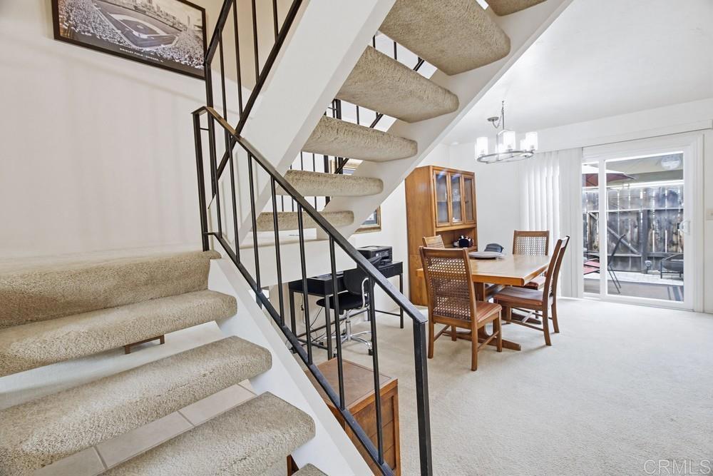 7861 Rancho Fanita Drive, Unit B Santee, CA 92071 - Photo 20 of 47 a view of a livingroom with furniture and staircase