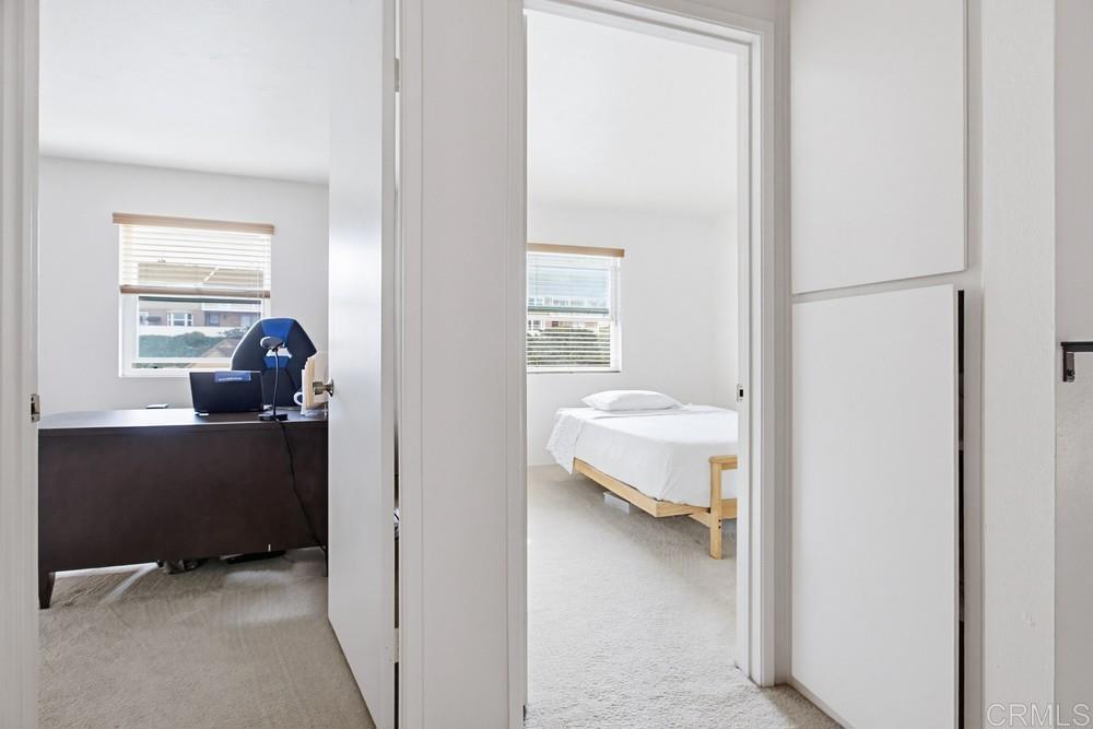 7861 Rancho Fanita Drive, Unit B Santee, CA 92071 - Photo 27 of 47 a view of a bedroom with a bed and a window