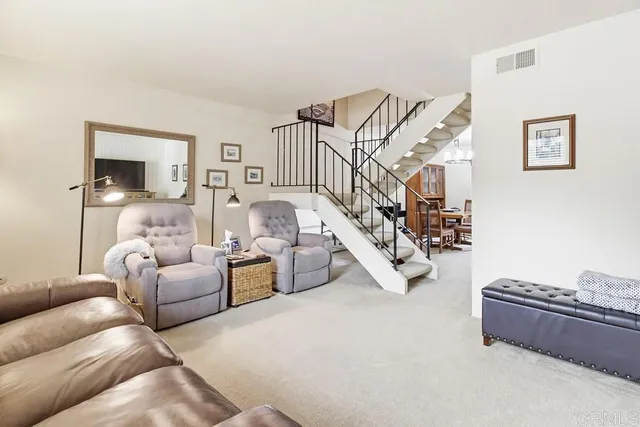 a living room with furniture and a couch