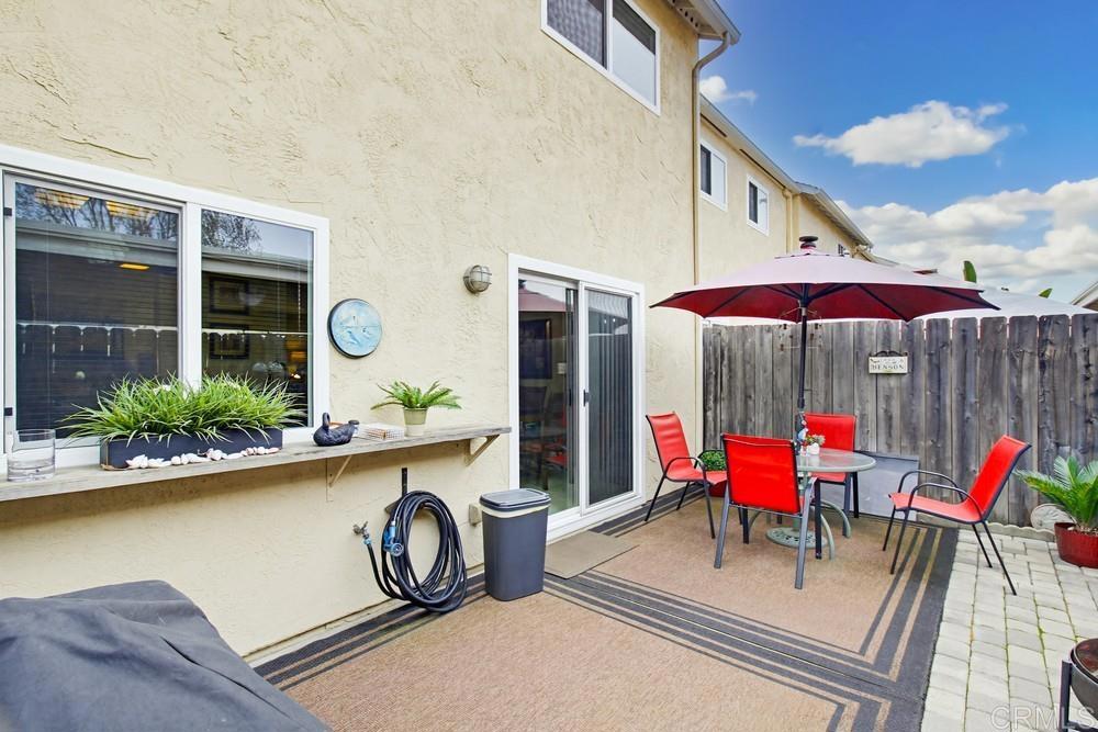 7861 Rancho Fanita Drive, Unit B Santee, CA 92071 - Photo 35 of 47 a patio with table and chairs