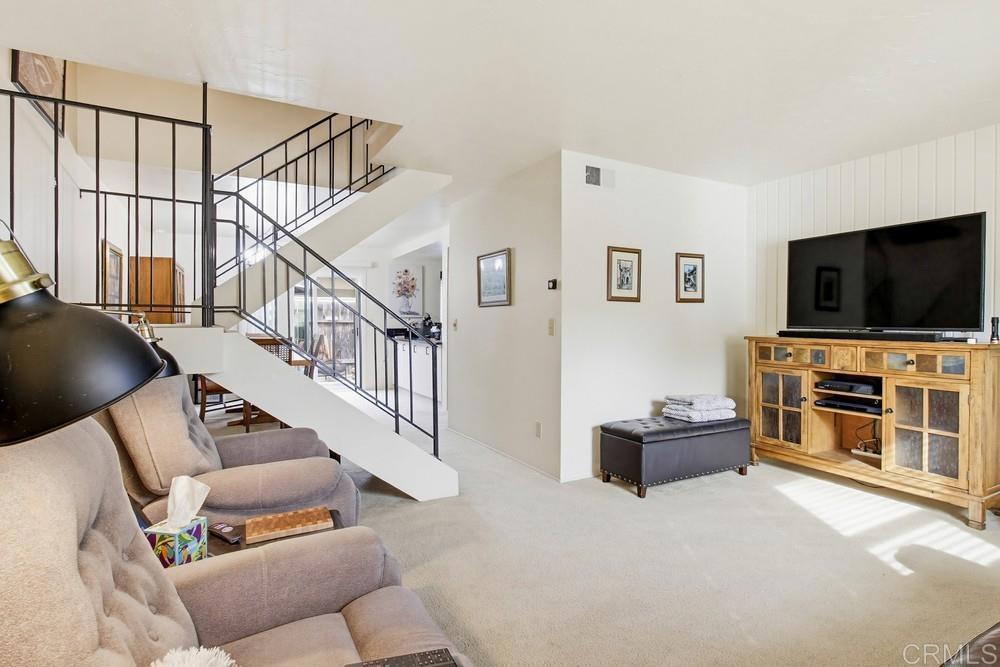 7861 Rancho Fanita Drive, Unit B Santee, CA 92071 - Photo 4 of 47 a living room with furniture and a flat screen tv