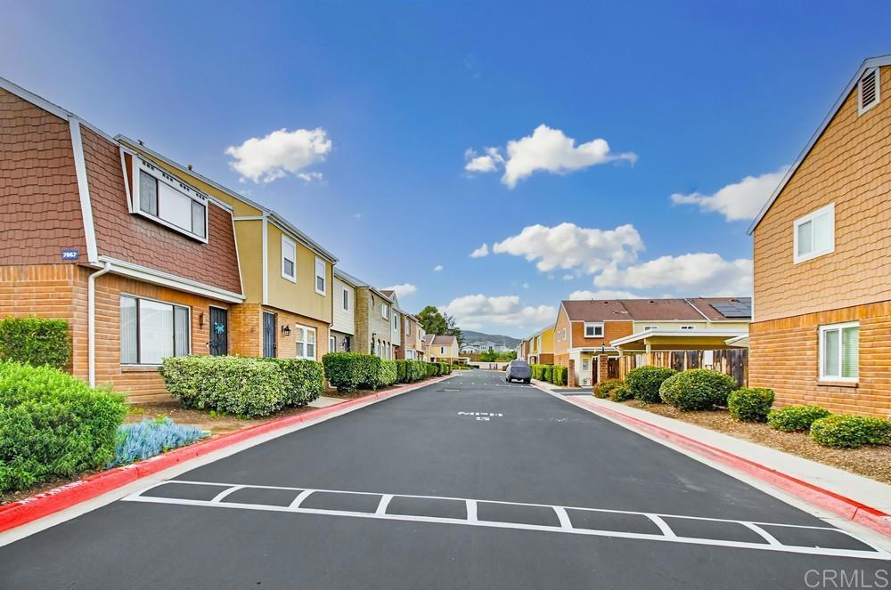 7861 Rancho Fanita Drive, Unit B Santee, CA 92071 - Photo 41 of 47 a view of a street with a building in the background