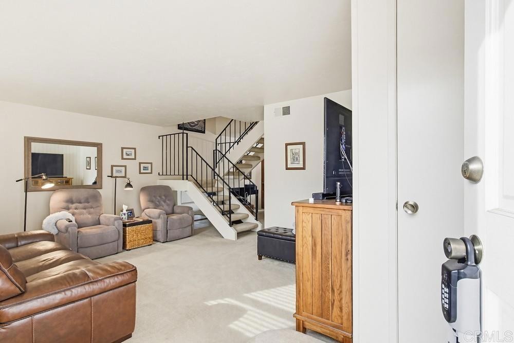 7861 Rancho Fanita Drive, Unit B Santee, CA 92071 - Photo 45 of 47 a view of a livingroom with furniture and windows