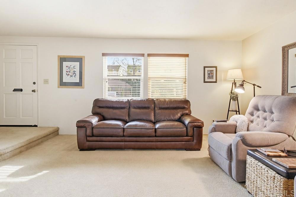 7861 Rancho Fanita Drive, Unit B Santee, CA 92071 - Photo 46 of 47 a living room with furniture and a window