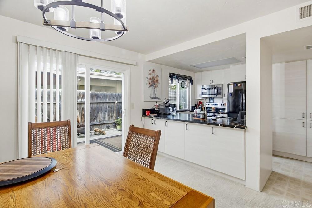 7861 Rancho Fanita Drive, Unit B Santee, CA 92071 - Photo 7 of 47 a living room with furniture and a wooden floor