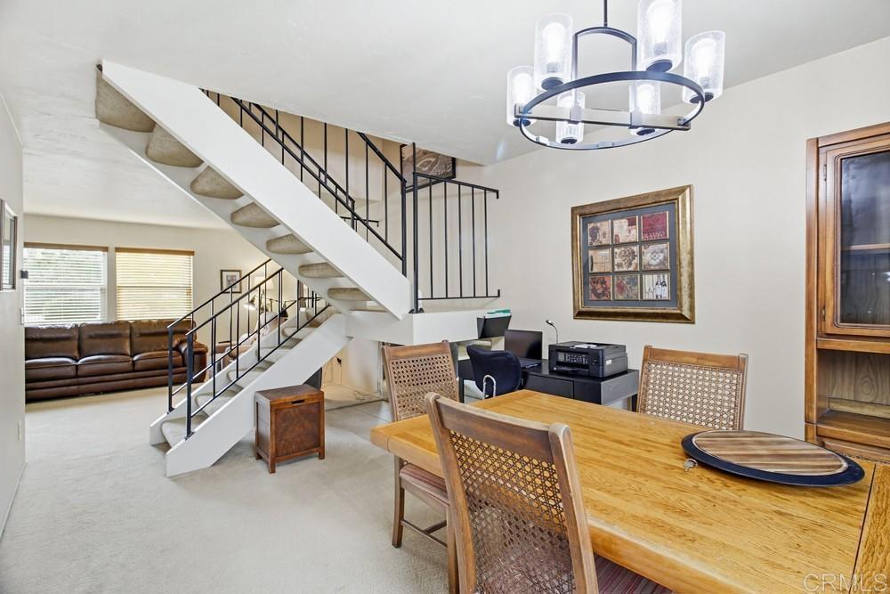 7861 Rancho Fanita Drive, Unit B Santee, CA 92071 - Photo 8 of 47 a bedroom with furniture and a wooden floor