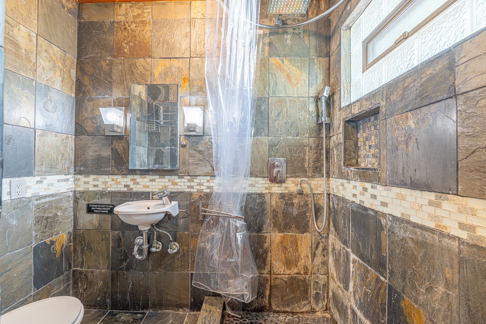8548 Findlay Street Houston, TX 77017 - Photo 35 of 50 a bathroom with a sink and toilet