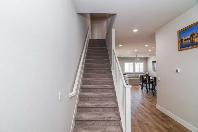 a view of an empty room and a window