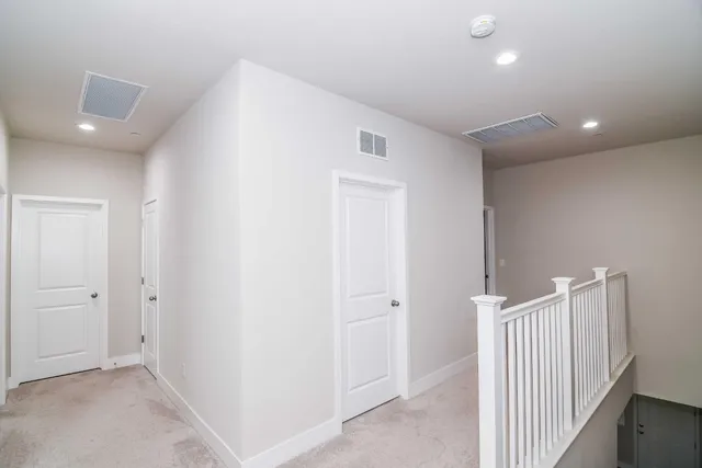 a bed room with a bed and dresser