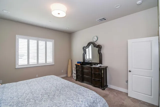 a view of a room with windows