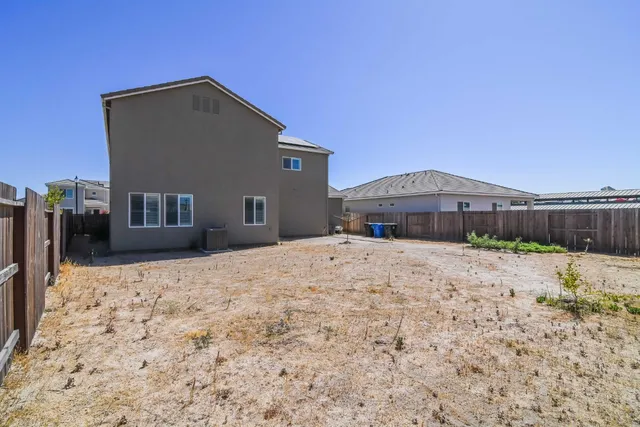 a view of a house with a swimming pool